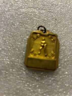 Gold-f Vintage Pendant with Raised Figure